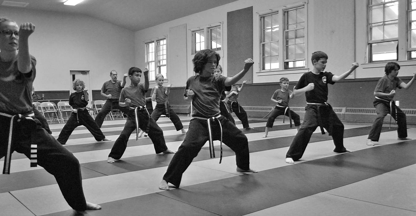 Junior karate students training